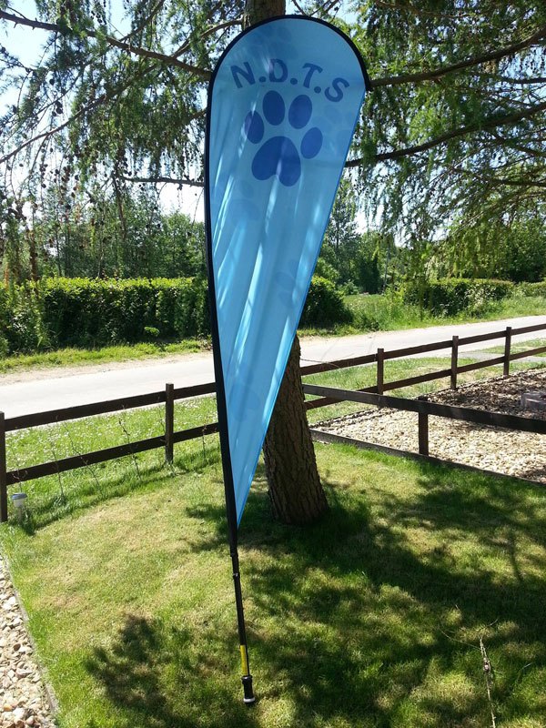 Photo of Norfolk Dog Training Society flag on a sunny day